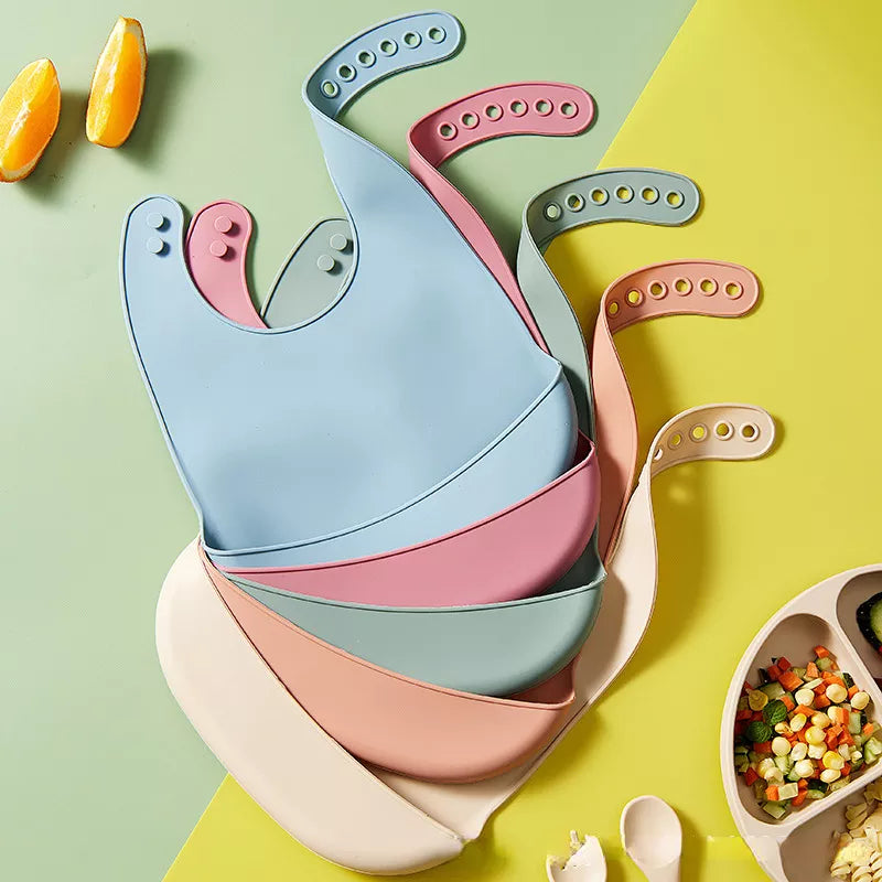 Bavaglino in silicone con tasca per neonati multivariante