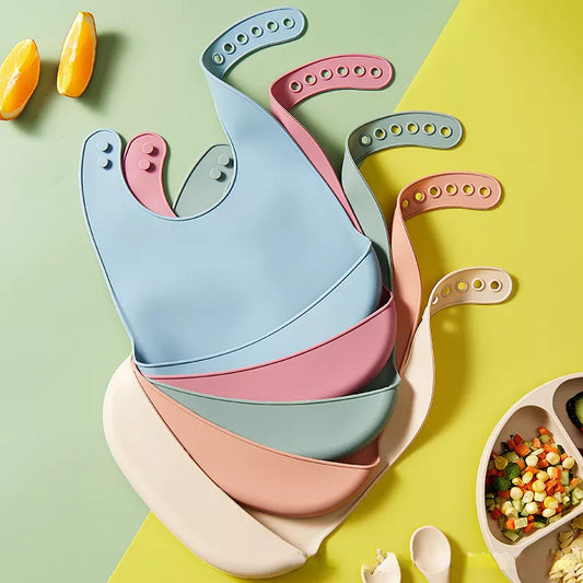 Bavaglino in silicone con tasca per neonati multivariante